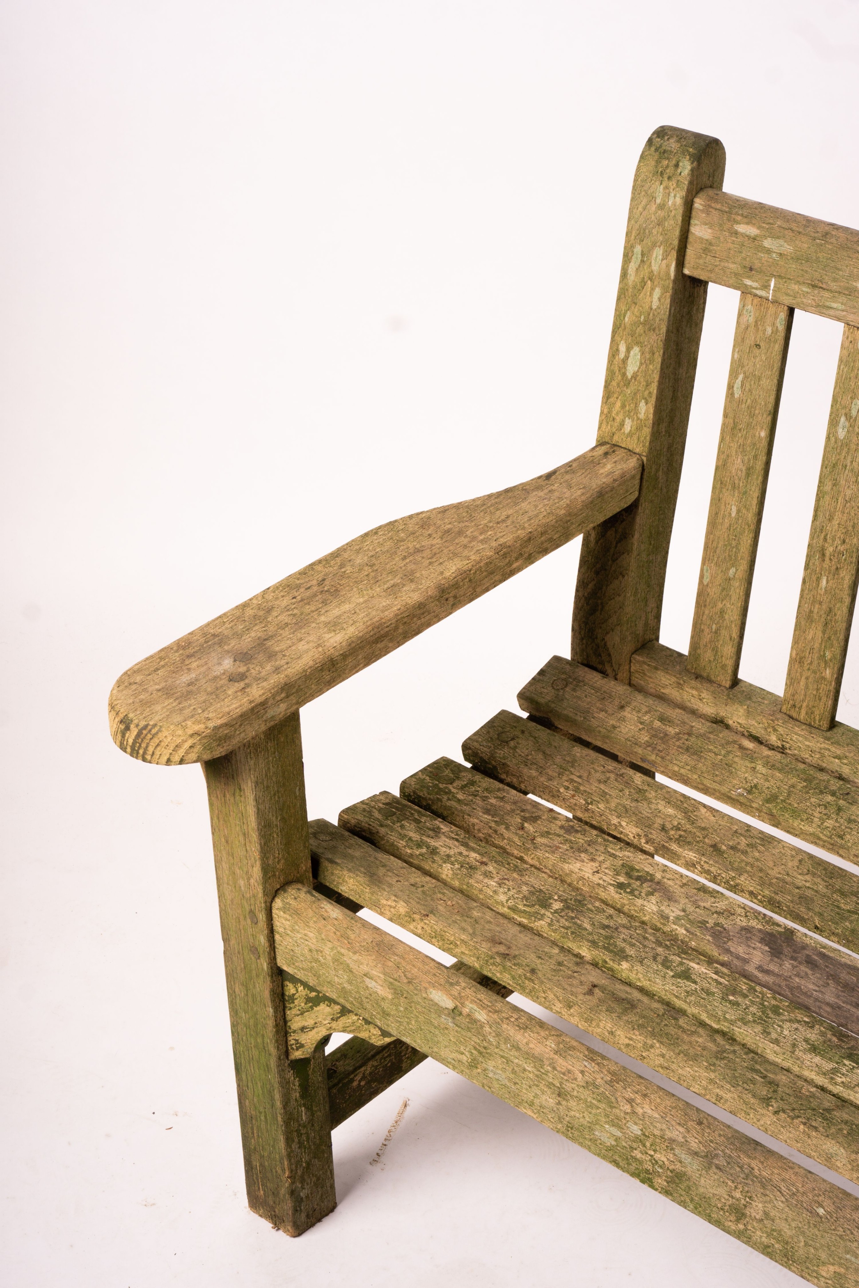 A weathered teak garden bench, length 192cm, width 60cm, height 85cm